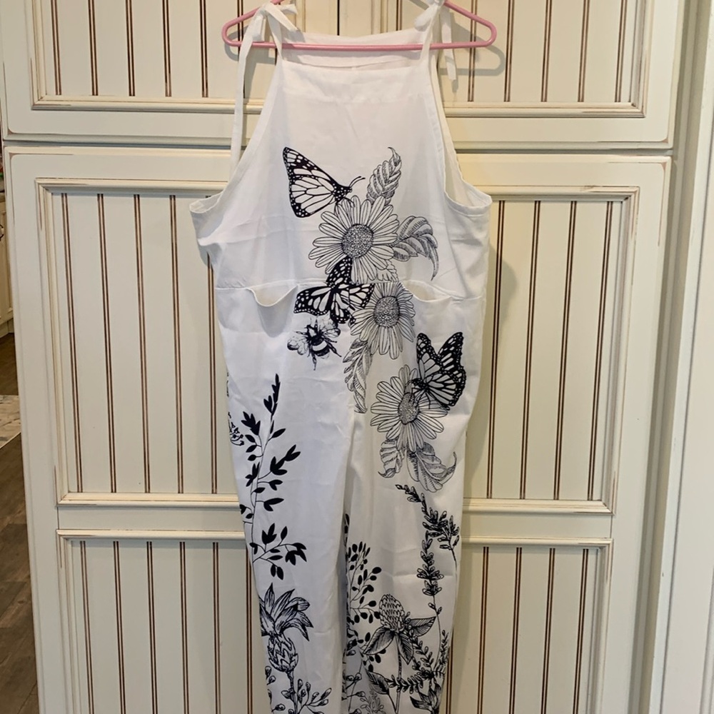 White with black trim, jumper, lightweight, polyester, and spandex size large